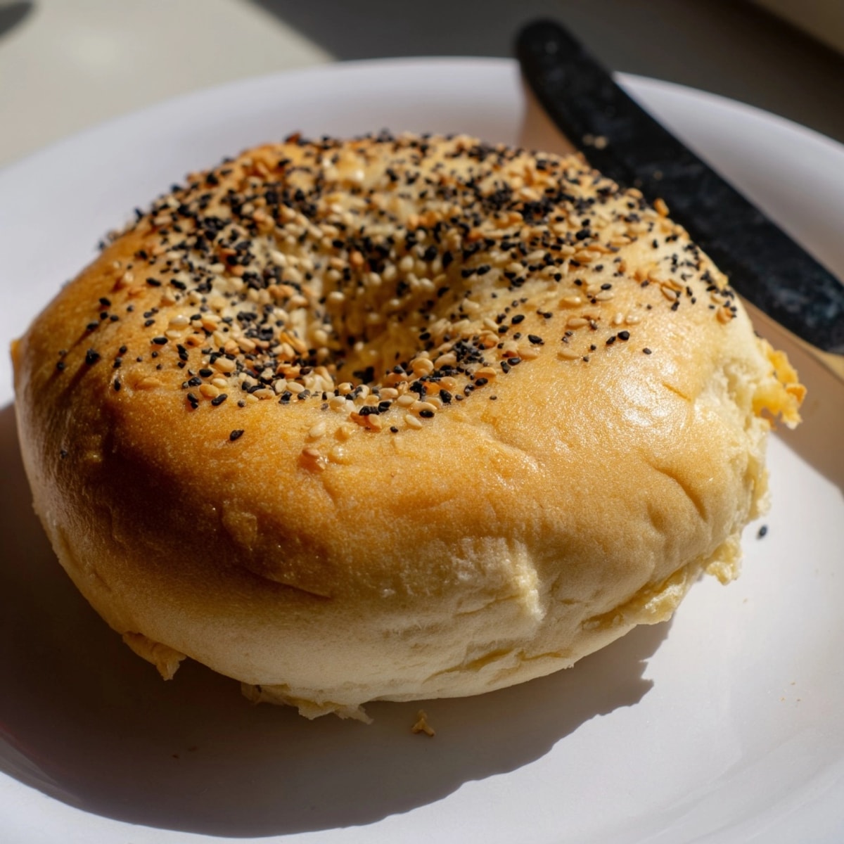 Golden 2-Ingredient Protein Bagels fresh from the oven, topped with everything bagel seasoning.
