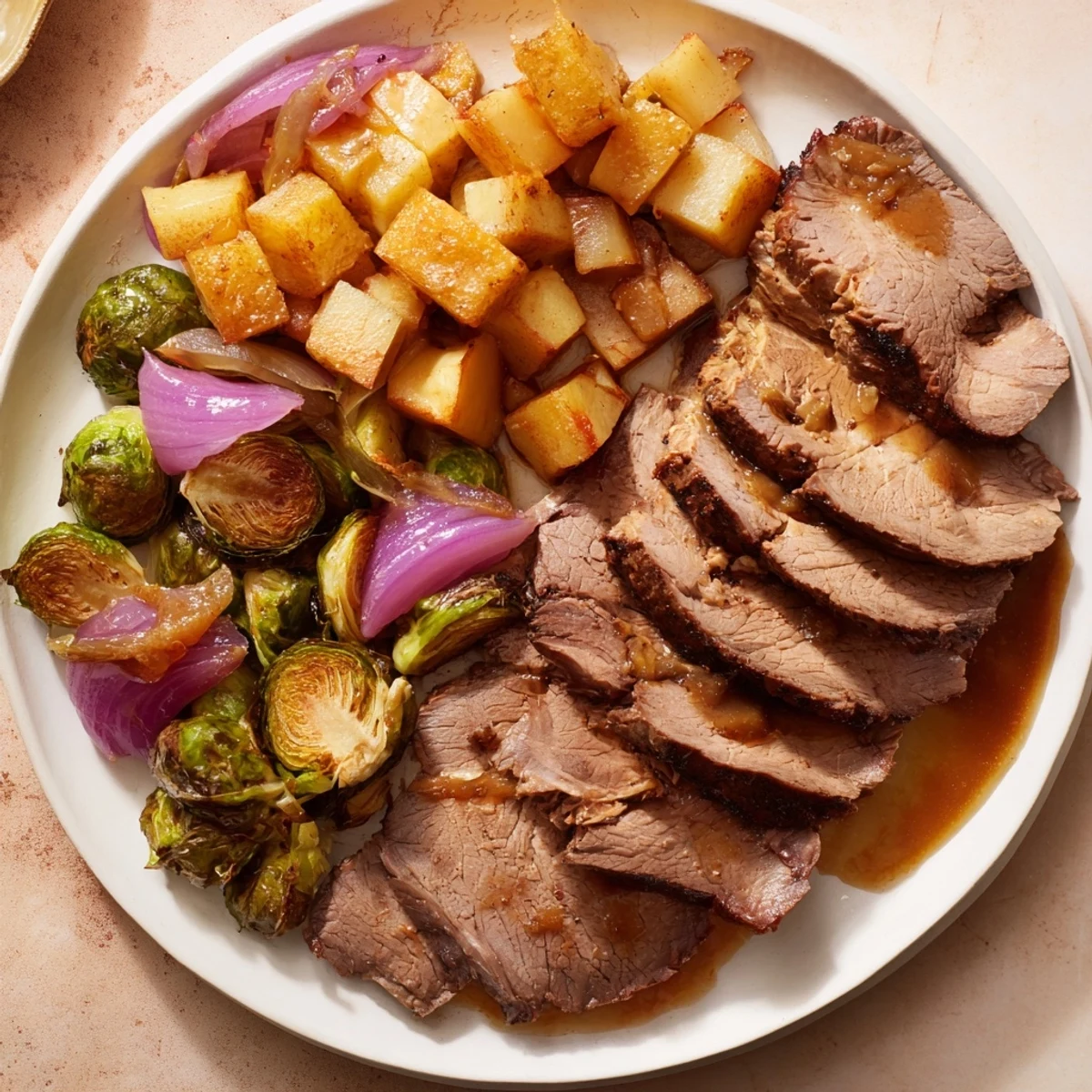 A flavorful Seasonal Glow Keto Roast, featuring beautifully browned beef and aromatic, perfectly cooked vegetables.