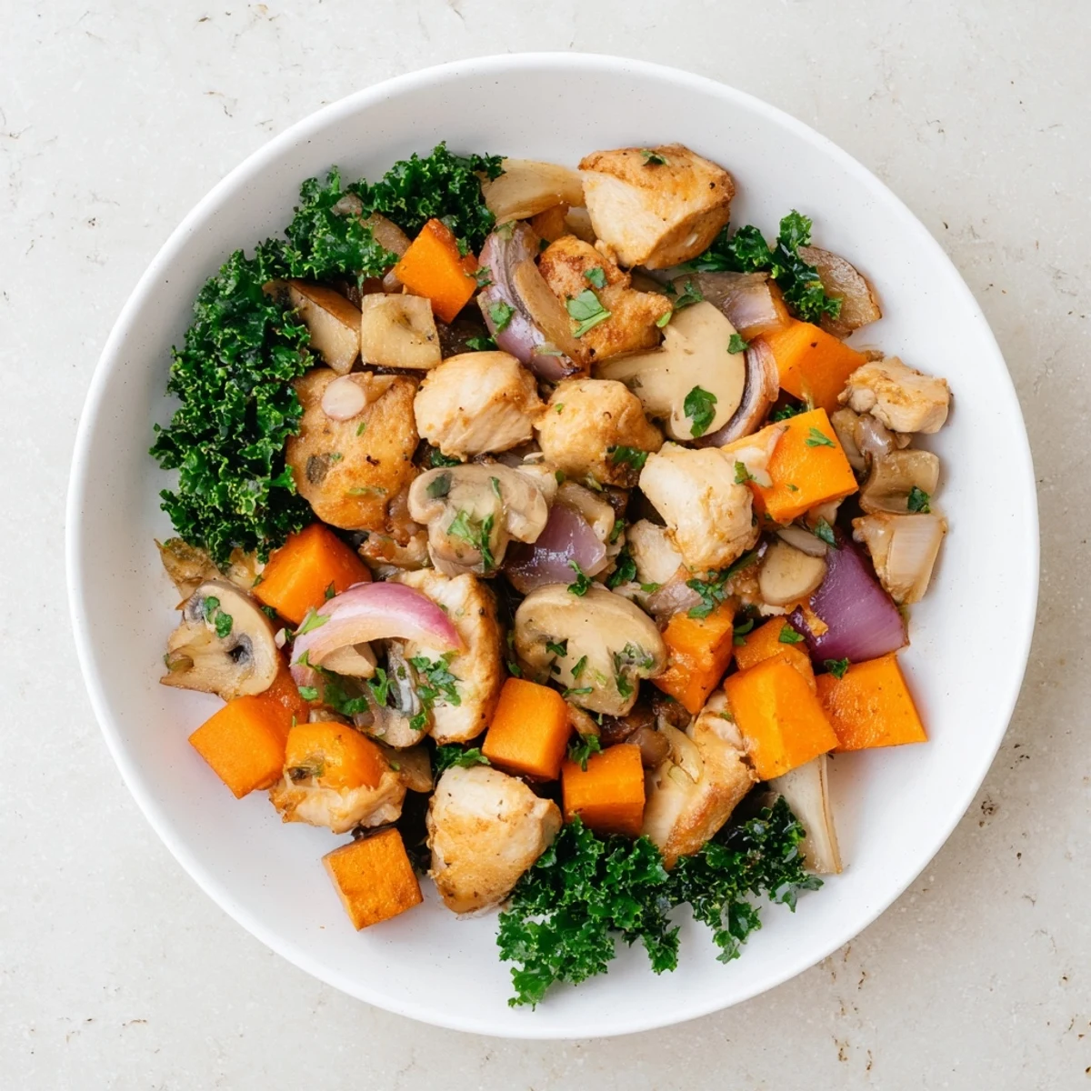 Savory and vibrant Winter Wellness Paleo Skillet, featuring perfectly cooked chicken and root vegetables in a skillet.
